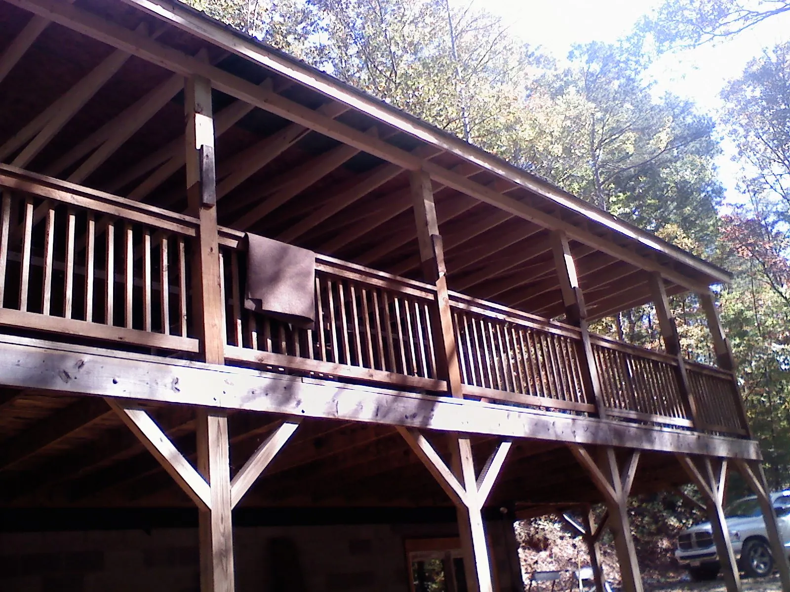 Timber framing under a new elevated porch and deck — Roof Leak Repair in Brick by Roofing Brothers